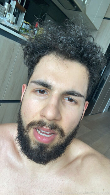 curly.brown.hairdude